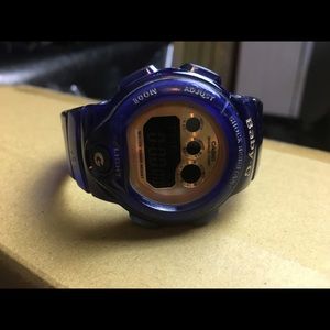 BABY G SHOCK WATCH BLUE W/BEAUTIFUL GOLD FACE.